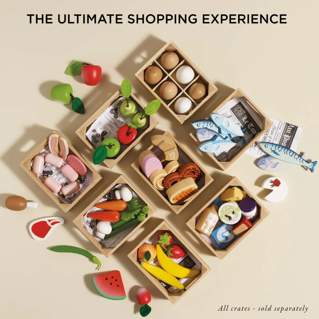 Wooden toy crates with miniature food items on a beige background, labeled 'The Ultimate Shopping Experience'. MARKET FISH WOODEN TOY CRATE | LE TOY VAN