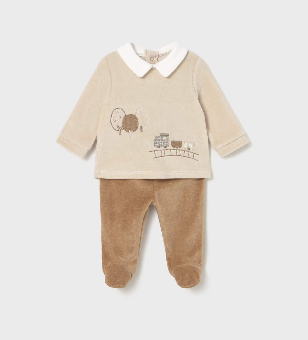 Mayoral Baby Cosy Jumper and Footed Trouser Set in Toffee — front ghost flat-lay on light grey background; two-piece velour baby outfit; cream/oat velour long-sleeve jumper with white Peter Pan collar at the neckline; embroidered and appliqué steam train scene on the front showing a little steam train on a railway track with two carriages and two round-topped trees in taupe, grey-blue and cream tones; long sleeves with turned-back cuffs; warm toffee/caramel velour footed trousers with integrated feet; light