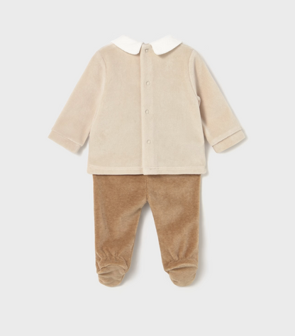 Mayoral Baby Cosy Jumper and Footed Trouser Set in Toffee — back ghost flat-lay on light grey background; two-piece velour baby outfit; cream/oat velour long-sleeve jumper showing the plain back with white Peter Pan collar visible from behind at the neckline; back popper closure running down the centre back of the jumper for easy dressing; long sleeves with turned-back cuffs; warm toffee/caramel velour footed trousers with integrated feet; light grey background; demonstrates the back silhouette and the back