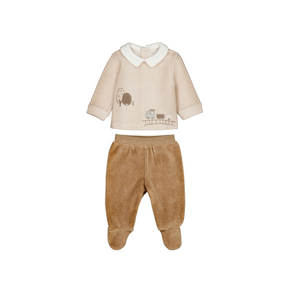 Mayoral Baby Cosy Jumper and Footed Trouser Set in Toffee — front ghost flat-lay on white background with the two pieces slightly separated; cream/oat velour long-sleeve jumper with white Peter Pan collar and embroidered steam train scene on the front; warm toffee/caramel velour footed trousers shown separately below with the elasticated waistband clearly visible at the top; integrated feet at the bottom of the trousers; white background; demonstrates the two pieces of the set individually and the elasticat
