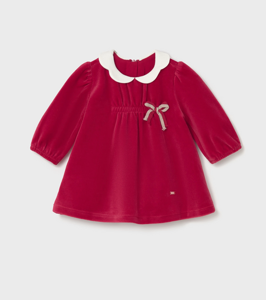 Front flat — cherry red velvet; cream Peter Pan collar; taupe ribbon bow at chest; puffed sleeves with elasticated cuffs; A-line gathered skirt; Mayoral logo tag. 