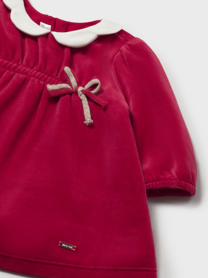 Close-up front — velvet pile texture; taupe bow detail; ruched chest band; elasticated cuff; Mayoral logo tag.