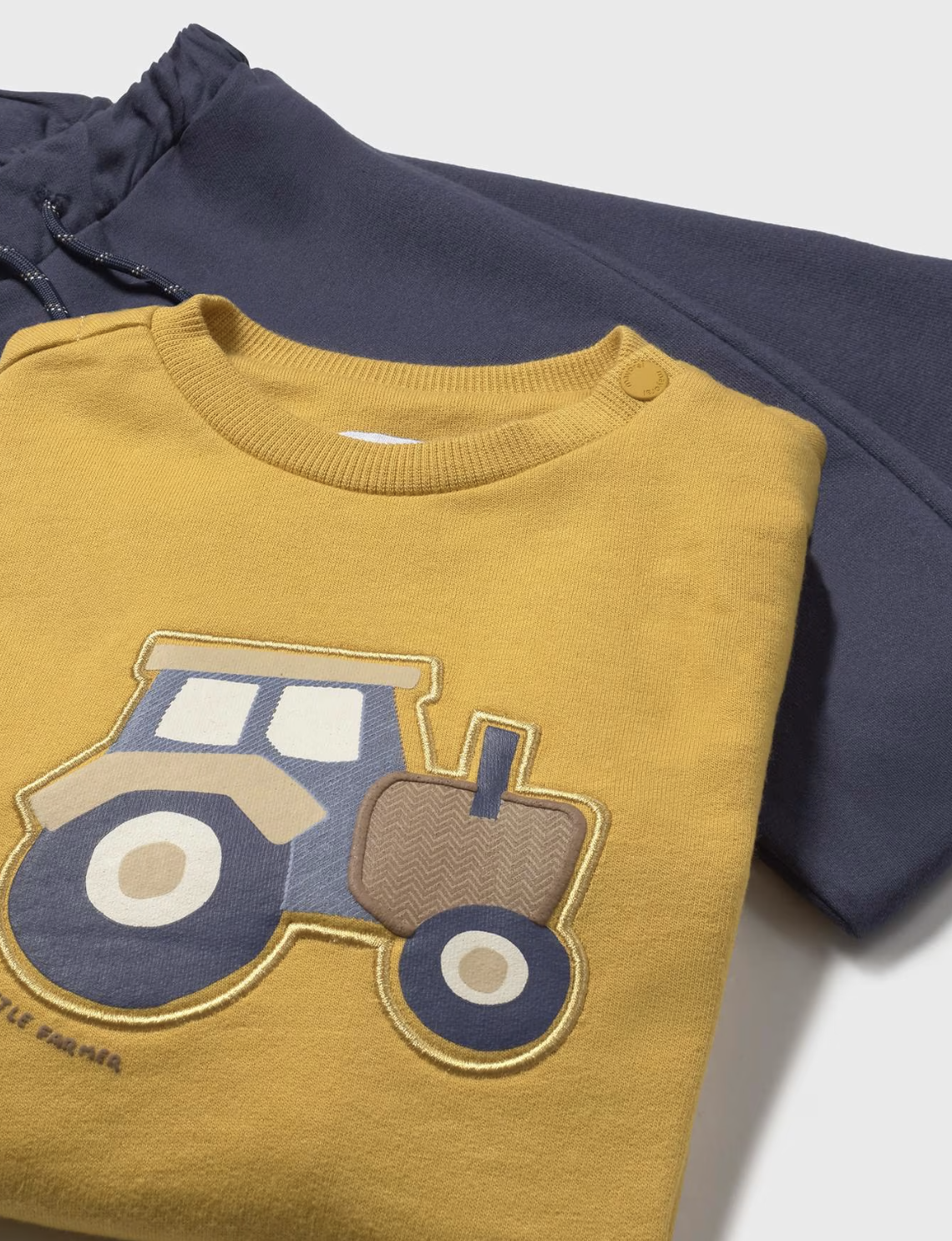 Mayoral boys Yellow sweater with a tractor design and blue joggers outfit