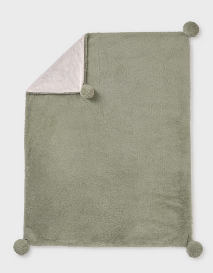 Green blanket with pom-pom edges on a white background. MAYORAL FAUX FUR BABY POM POM BLANKET - SAGE