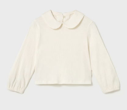 Cream blouse isolated — Peter Pan collar, balloon sleeves, elasticated cuffs.