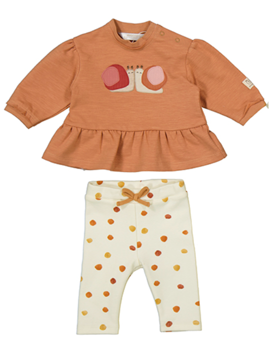 Front flat — peplum silhouette; snail appliqué; puffed sleeves; polka dot leggings; cinnamon bow. 