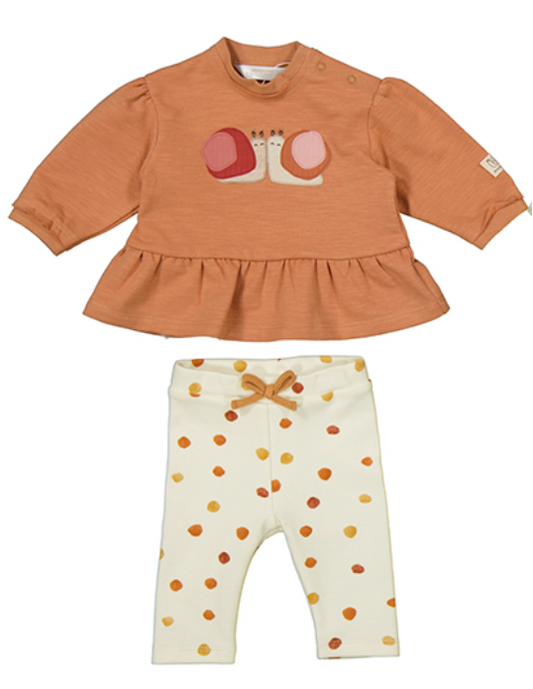 Front flat — peplum silhouette; snail appliqué; puffed sleeves; polka dot leggings; cinnamon bow. 