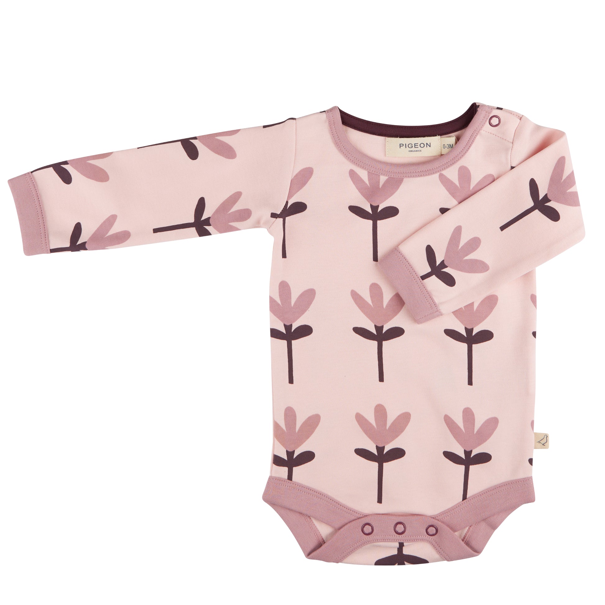 A long-sleeved BABY PINK baby body suit with PINK TULIP print and poppers at the shoulders and crotch. ORGANIC COTTON BABY BODYSUIT - PINK TULIP | PIGEON ORGANICS