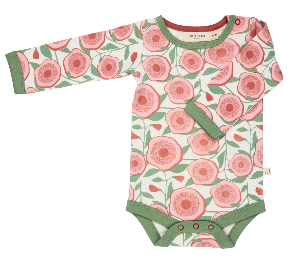 Floral-patterned baby onesie with green accents. ORGANIC COTTON BABY BODY - LARGE FLORAL | PIGEON ORGANICS