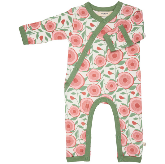Floral patterned baby romper with green accents. ORGANIC COTTON BABY SLEEPSUIT - LARGE FLORAL | PIGEON ORGANICS 