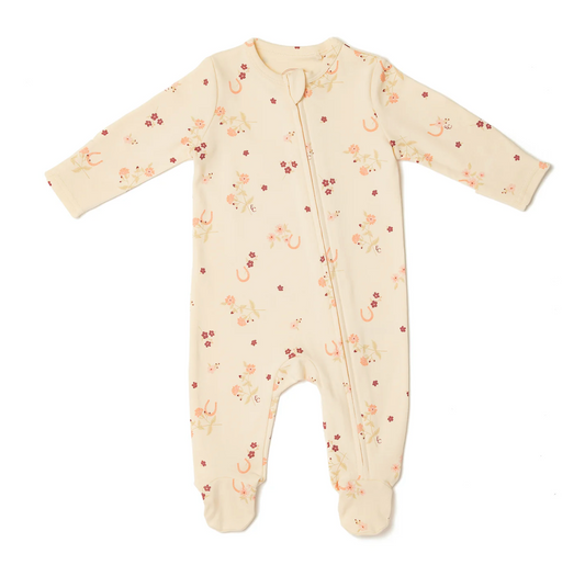 Baby onesie with a floral pattern. ORGANIC COTTON ZIP BABY SLEEPSUIT - HORSESHOE FLORAL