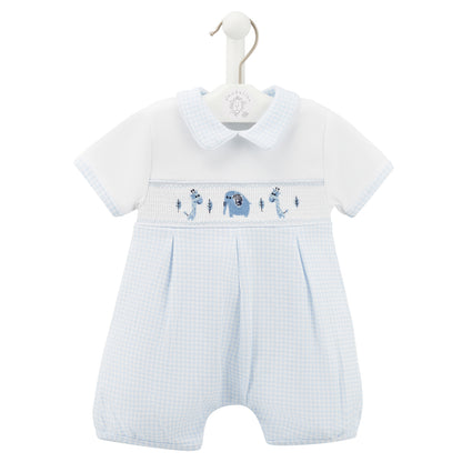 Baby romper with blue and white design on a hanger against a white background. SMOCKED JUNGLE FRIENDS COTTON BABY ROMPER WITH PETER PAN COLLAR | DANDELION 