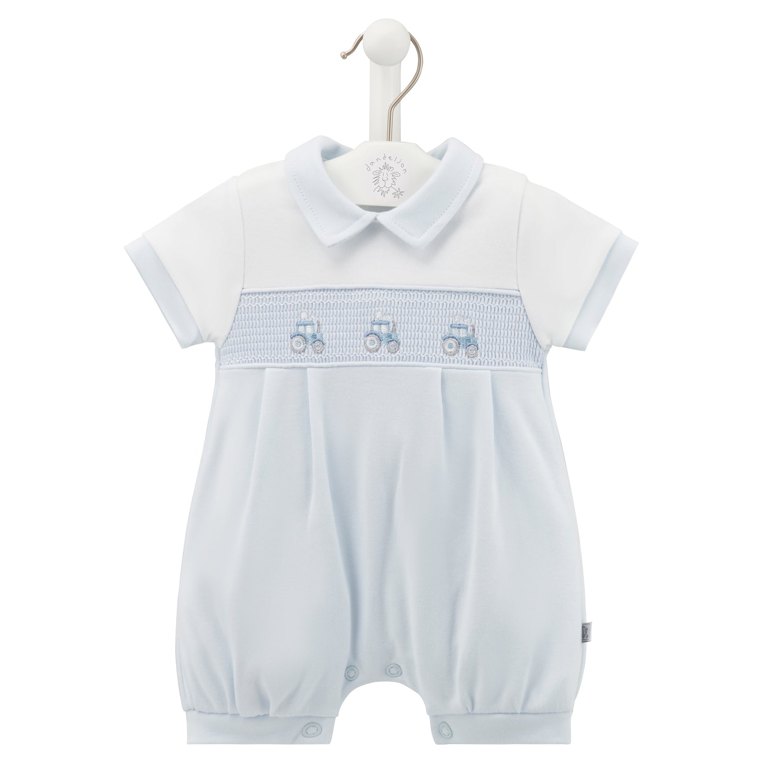 White baby romper with blue trim and embroidered details on a hanger. SMOCKED TRACTOR COTTON SUMMER ROMPER OUTFIT - BABY BLUE | DANDELION