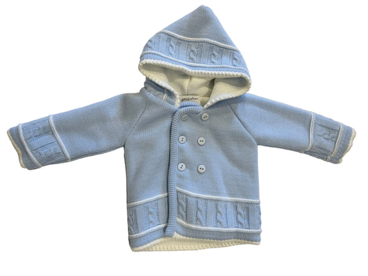 Blue baby jacket with white trim on a white surface
