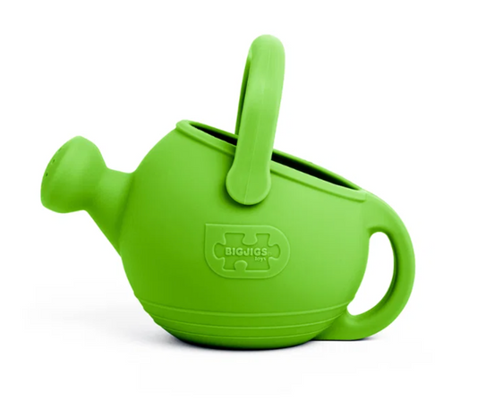Bigjigs lime green silicone children's watering can — side view showing traditional watering can silhouette with long spout, round rose head, wide carry handle, side grip handle and embossed Bigjigs Toys logo, on white background