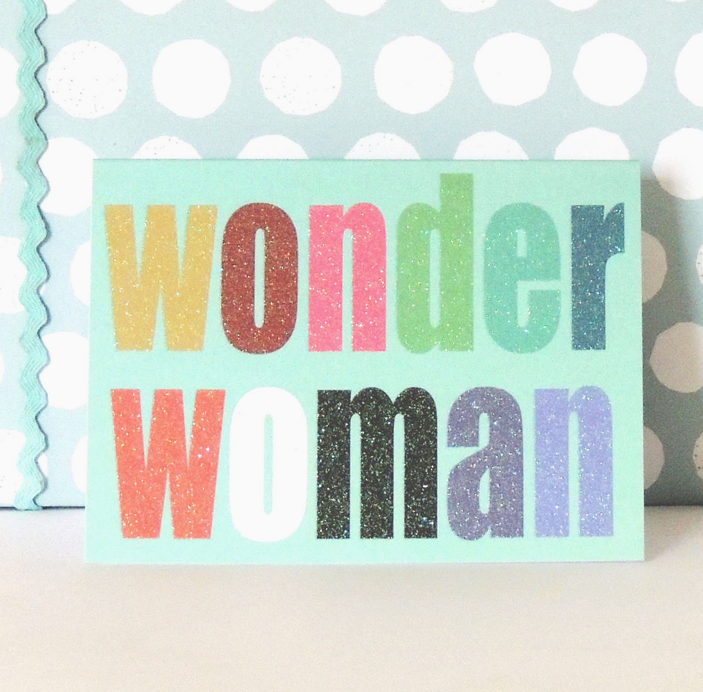MINI WONDER WOMAN CARD WITH GLITTER LETTERING | KALI STILEMAN