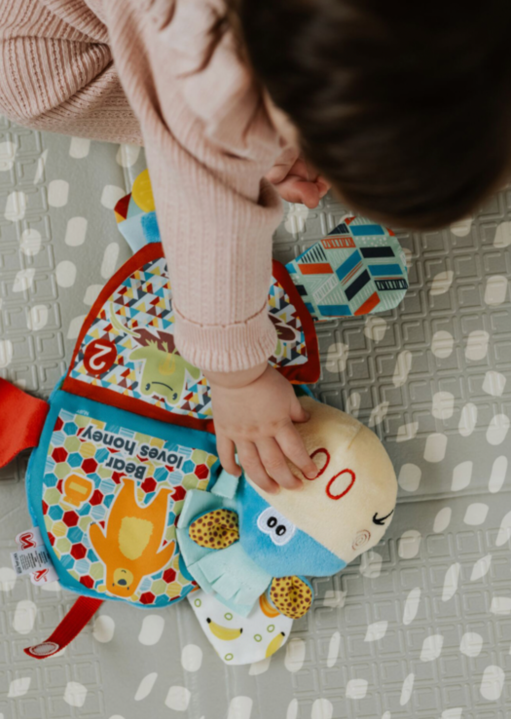 FLIP FLOP PONY TEETHER BOOK | NUBY