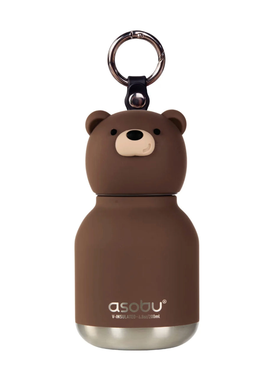 A brown bear-shaped Asobu insulated bottle with a stainless steel base and a metal key ring, shown on a plain white background.