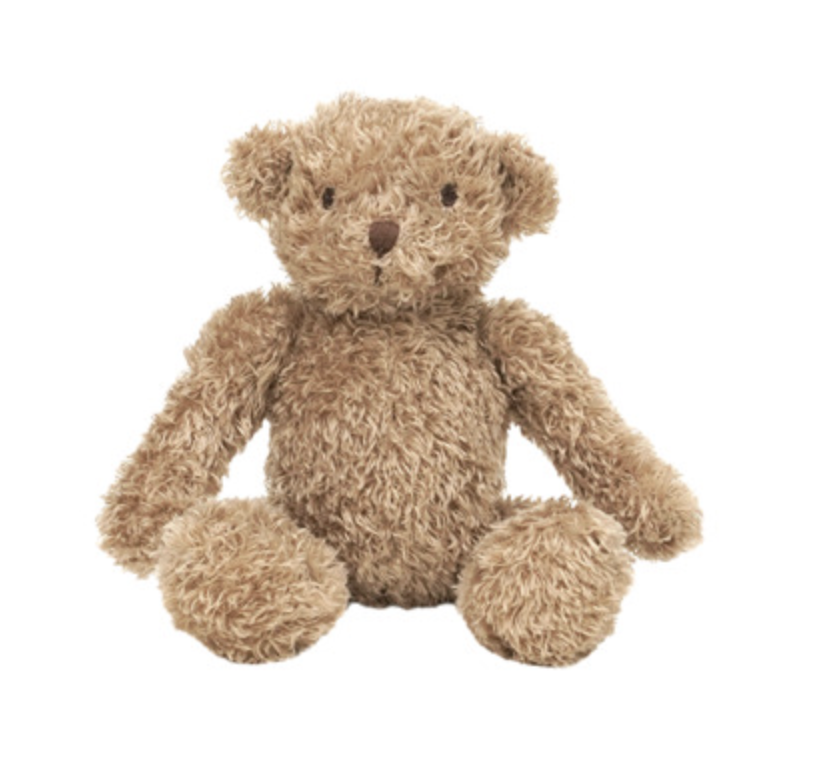 A plush teddy bear made of curly, shaggy brown faux fur, sitting against a solid white background.