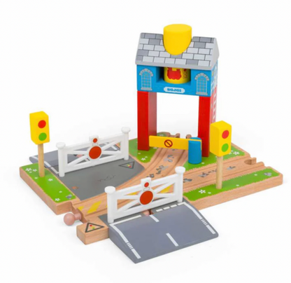 A wooden toy train crossing set with a signal tower, two traffic lights, two crossing barriers, and a curved wooden track on a white background.