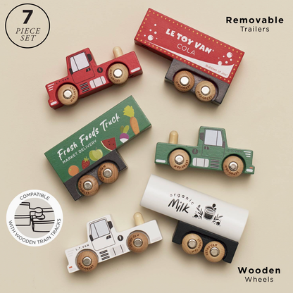 A 7-piece wooden toy truck set with colorful trailers and wooden wheels, displayed on a beige background with text overlays and a compatibility badge.