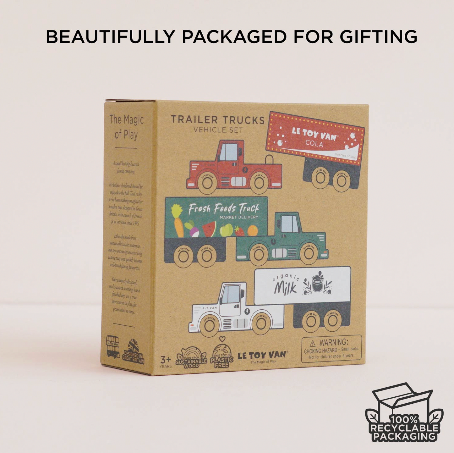 LE Toy Van Colab Trailer Trucks Vehicle Set in its original kraft paper packaging, displayed on a clean white background with promotional text at the top and a recycling logo at the bottom right.