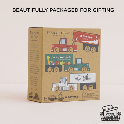 LE Toy Van Colab Trailer Trucks Vehicle Set in its original kraft paper packaging, displayed on a clean white background with promotional text at the top and a recycling logo at the bottom right.