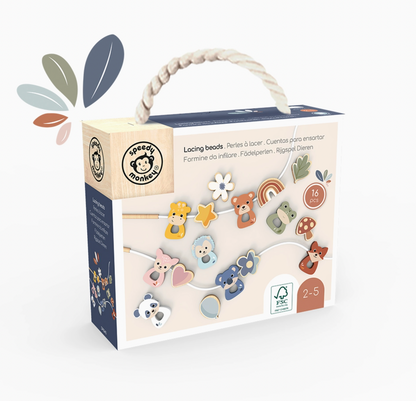 A boxed craft set labeled 'Lacing beads' by Dreamy Dragons, shown in its retail packaging with a rope handle. The box features illustrations of colorful wooden beads and small icons indicating age 2-5 and eco-friendly certification.