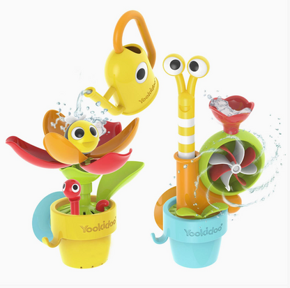 A set of two Yooldoo baby water toys on a white background. One toy is a yellow flower watering canister with a yellow watering can, red flower petals, and a green leaf sprayer.