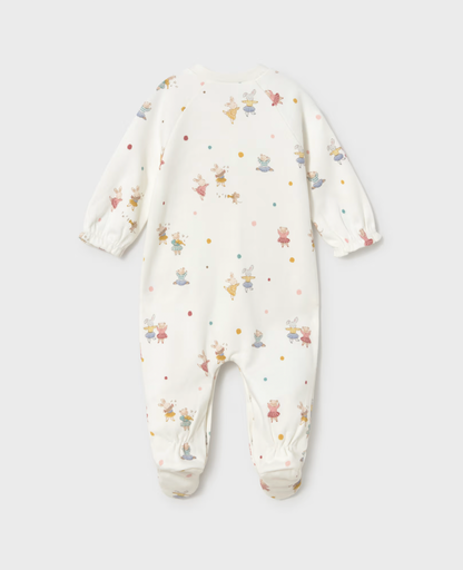 A baby long-sleeve footed sleeper in cream with a colorful cartoon bunny pattern, shown flat on a light gray background.