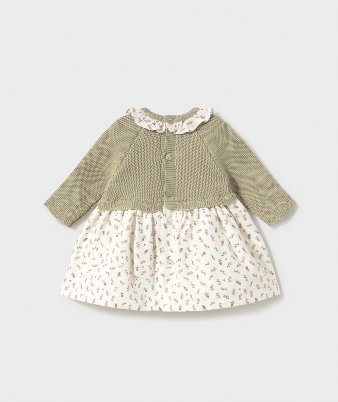 A baby girl's long-sleeve dress with a solid olive green knit top and a white skirt featuring a small pink and green floral print, shown against a light gray background.