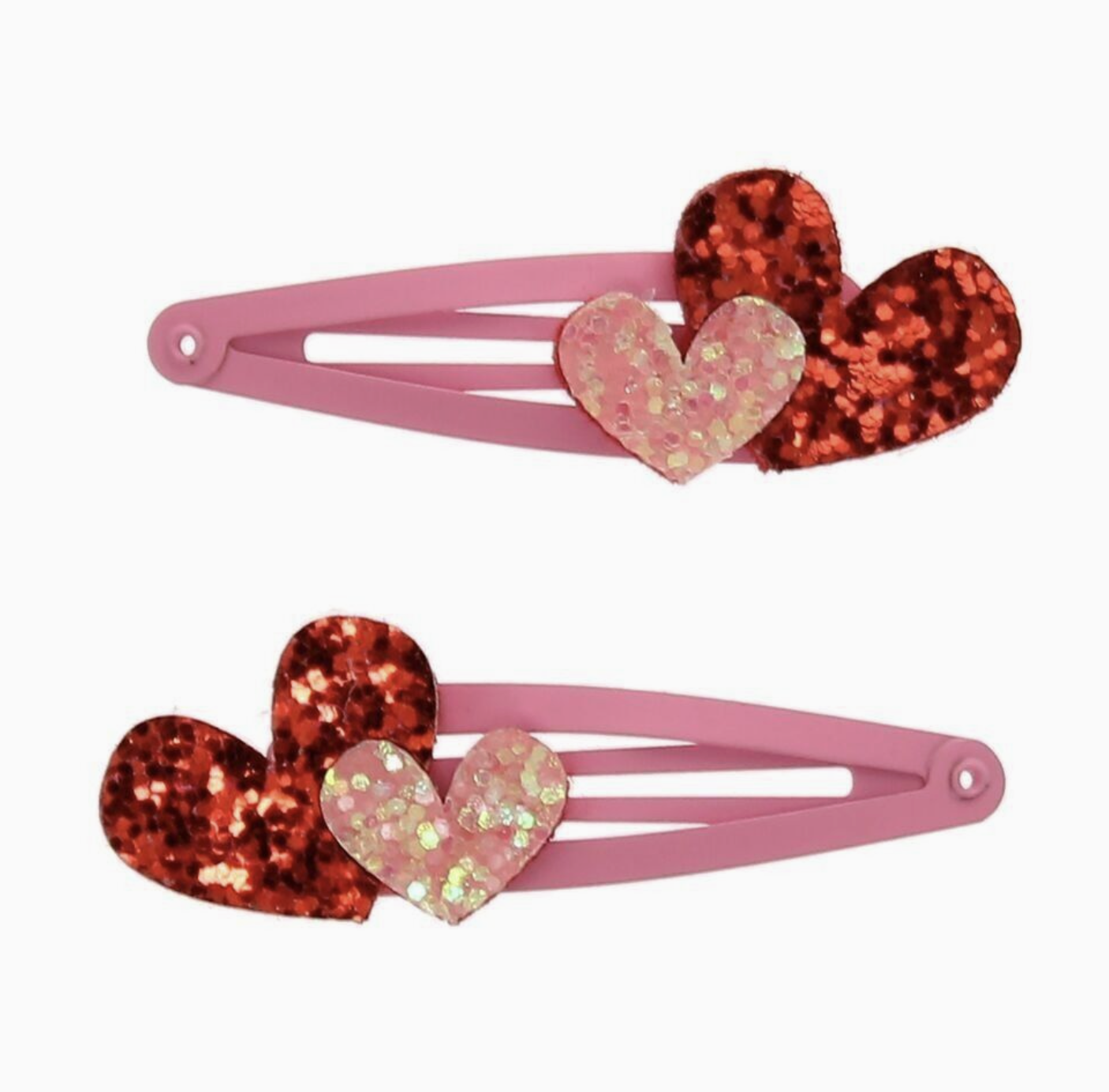 Two pink hair clips with glittery red and holographic heart accents, displayed on a clean white background.