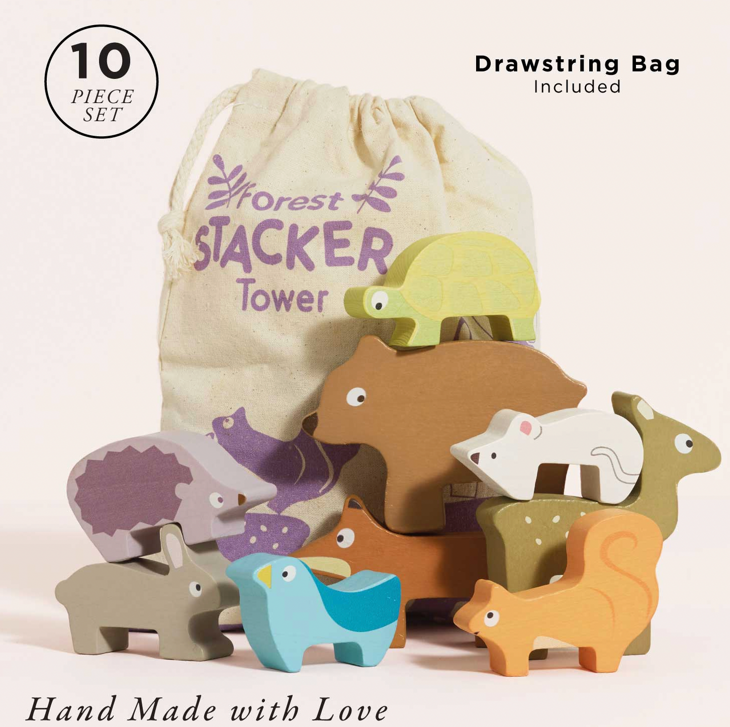 Le Toy Van Forest Stacking Wooden Animals set — "10 Piece Set" and "Drawstring Bag Included" labels; all 10 pieces shown with cotton drawstring bag printed "Forest Stacker Tower" in purple; "Hand Made with Love" text