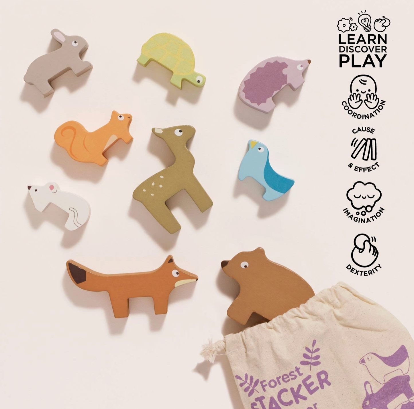 Le Toy Van Forest Stacking Wooden Animals set — flat lay of all 9 animals on a neutral background with cotton drawstring bag; play skills icons for coordination, cause & effect, imagination and dexterity; "Learn Discover Play" heading; animals include rabbit, tortoise, hedgehog, squirrel, fawn, blue bird, white mouse, fox and bear