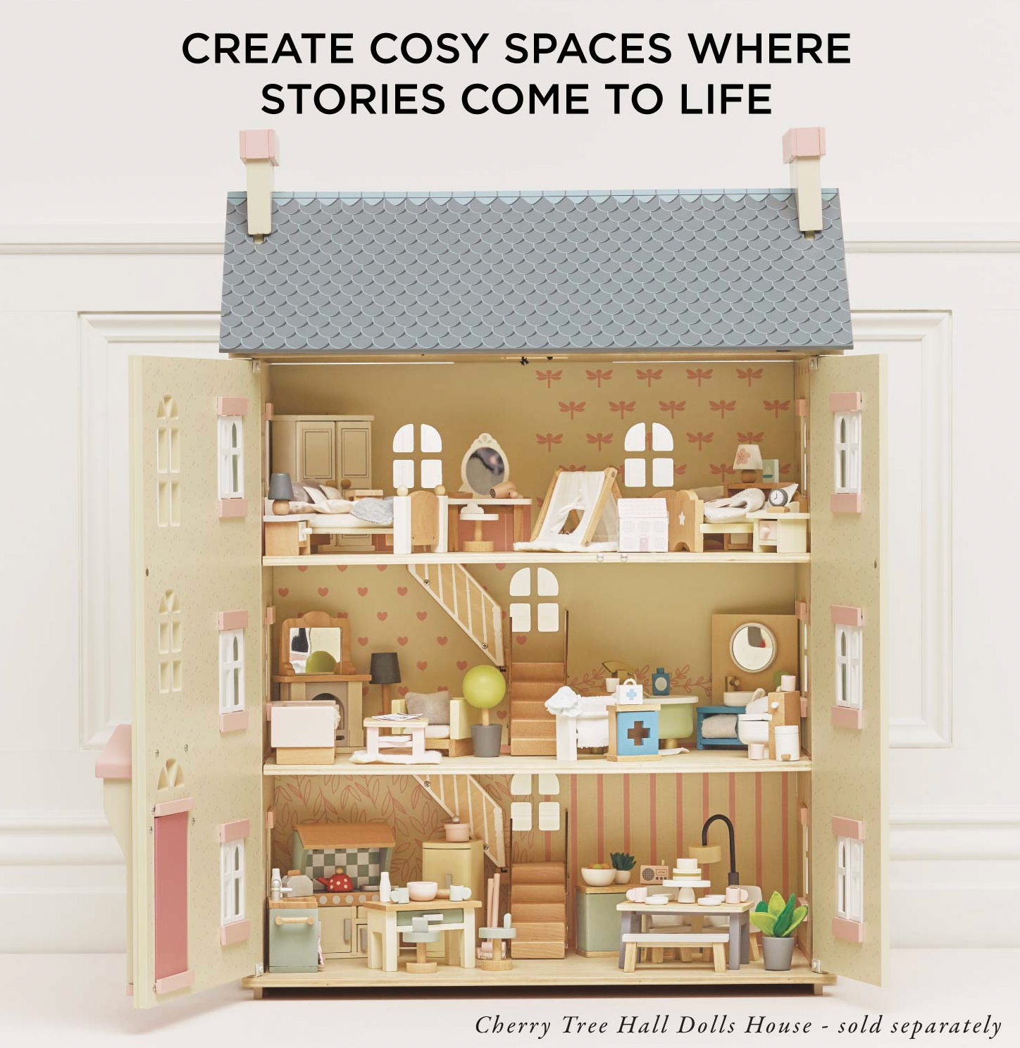 Le Toy Van children's bedroom dolls house furniture set — styled in a Le Toy Van Cherry Tree Hall dolls house (sold separately), showing the bedroom furniture in situ across multiple floors