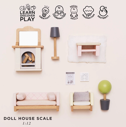 Le Toy Van sitting room dolls house furniture set — flat lay showing all pieces individually with "Doll House Scale 1:12" label and play skills icons for creativity, coordination, social skills, imagination and dexterity; includes fireplace with logs, floor lamp, side table, sofa, armchair, coffee table, miniature newspaper, chessboard and topiary
