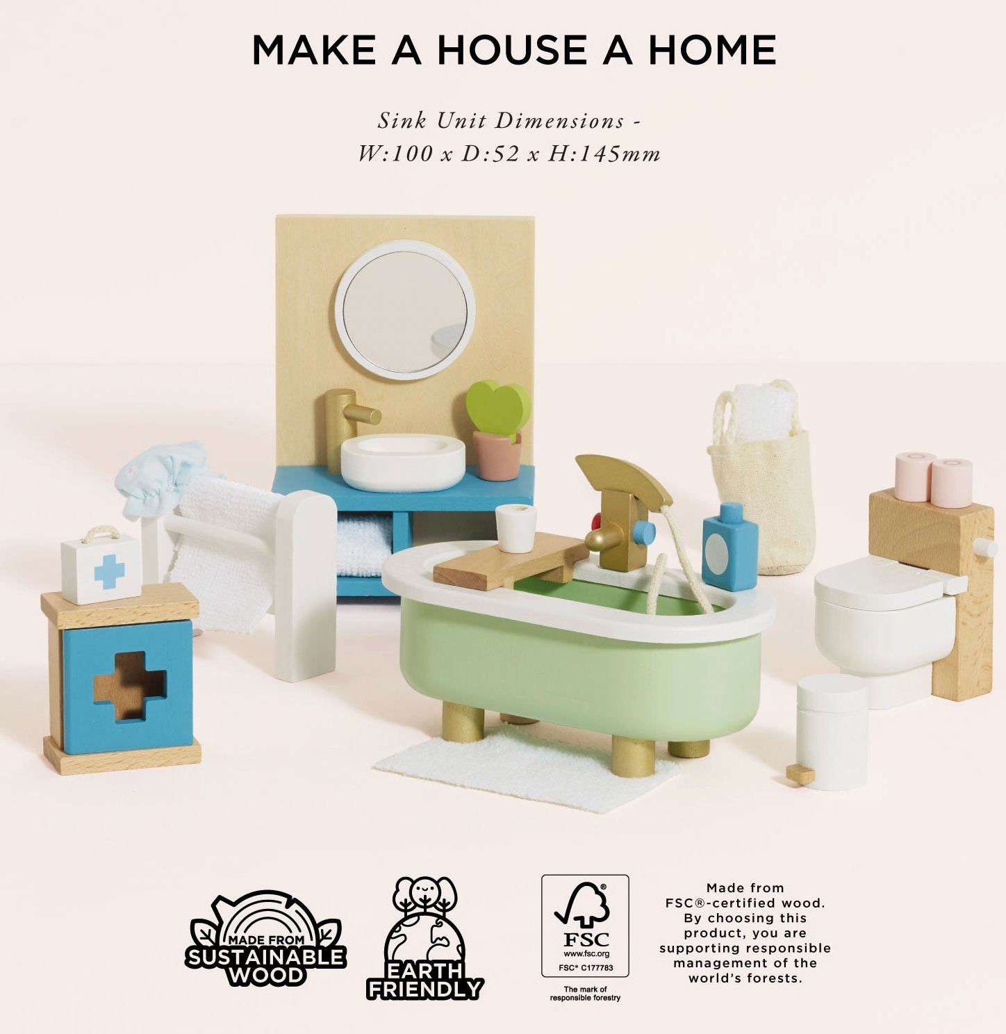 Le Toy Van wooden bathroom dolls house furniture set — styled scene with "Make a House a Home" heading and sink unit dimensions W:100 x D:52 x H:145mm; FSC certified sustainable wood and earth friendly badges; showing all pieces arranged together