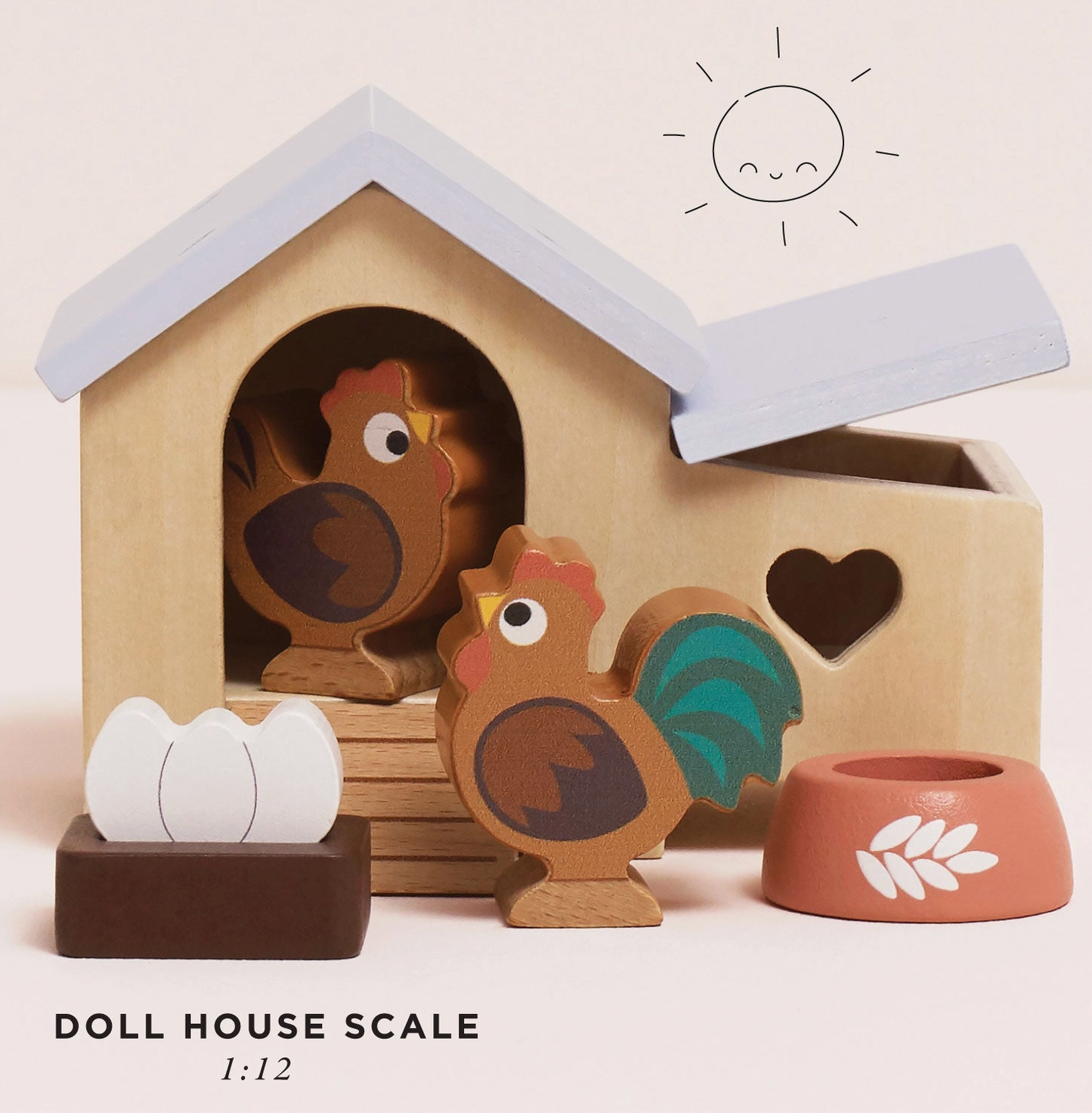 Le Toy Van wooden chicken coop set — styled scene with "Doll House Scale 1:12" label showing the coop with pale blue roof, wooden ramp, rooster with teal tail feathers, hen, nest box with eggs and terracotta food bowl