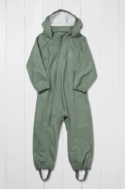 Grass & Air children's waterproof puddle suit in muted sage khaki green — front view flat lay on white background showing attached hood, waterproof front zip with zip guard, long sleeves with elasticated cuffs, full-length legs with elasticated ankles and integrated boot stirrups in matching khaki webbing