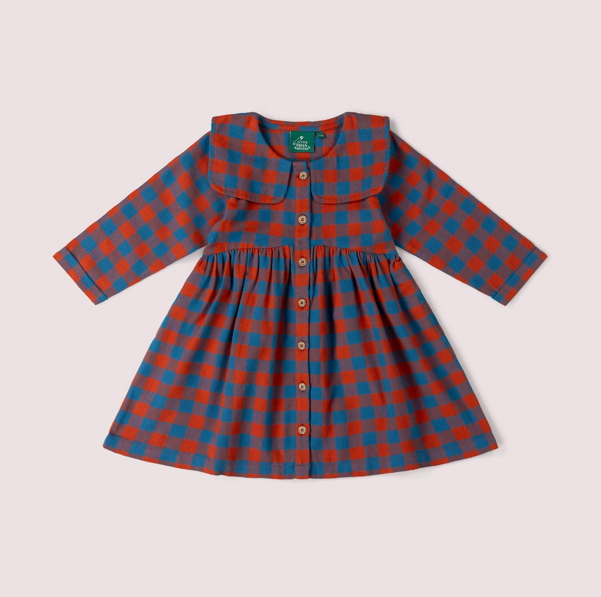 Little Green Rascals burnt ochre and teal blue check sailor dress — front flat lay on white background showing wide flat sailor collar, full-length button opening with natural coconut shell buttons, fitted bodice, full gathered skirt and long sleeves with plain cuffs; Little Green Rascals teal woven label at back neck