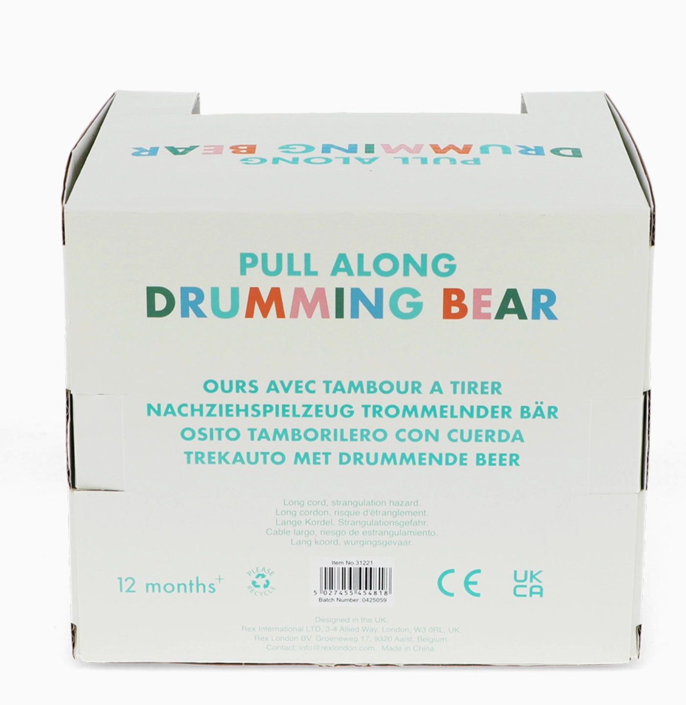 Box back; multicolour product name; French/German/Spanish/Dutch names; safety warnings; barcode Item No. 31221; 12 months+; CE/UKCA marks