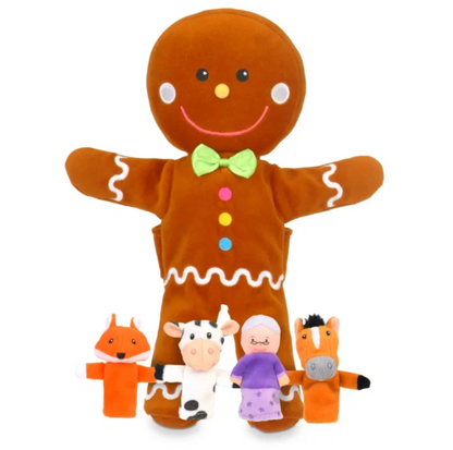  Front view — Gingerbread Man with arms spread; black button eyes, white cheeks, orange nose, pink smile, green bow tie, multicolour buttons, white zigzag trim; Fox, Cow, Old Woman and Horse finger puppets in a row in front