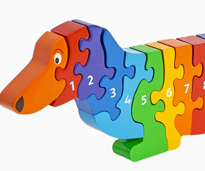 Close-up of head and pieces 1–8; orange head; pieces in orange, purple, indigo, blue, sky blue, green, yellow-green; numbers clearly legible