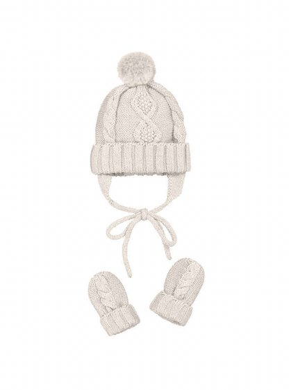 Mayoral Baby Hat and Mitten Set on a white background; warm cream cable knit baby hat with fluffy round pompom on top; raised central cable knit pattern running vertically from ribbed turn-up brim to crown; ribbed turn-up brim at the base of the hat in matching cream; ear flaps on both sides extending down from the hat; two long cream knit tie strings hanging down from the ear flaps for tying under the chin; pair of matching baby mittens displayed below the hat, left and right mitten side by side; matching 