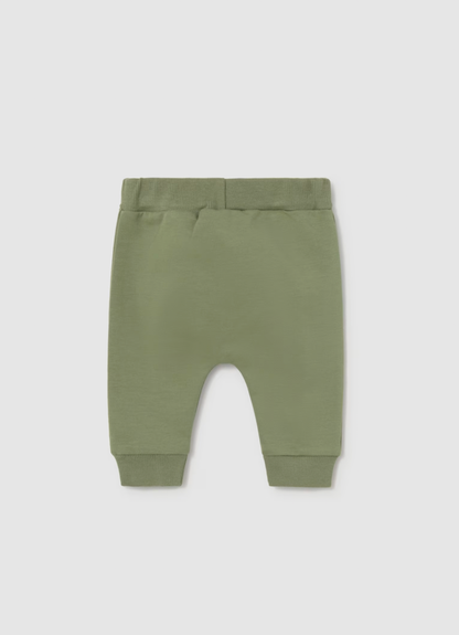 Grey BG trousers back view — clean back, ribbed waist and cuffs, tapered leg