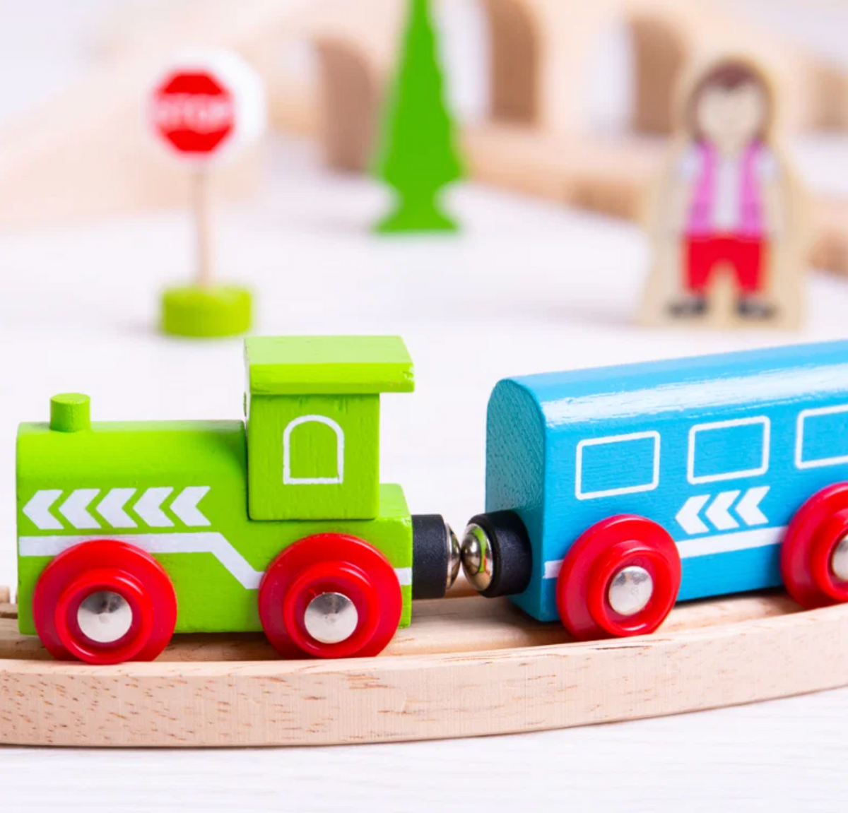 Bigjigs wooden railway train set with colourful engine and two carriages; Figure of Eight layout for imaginative play from 3 years
