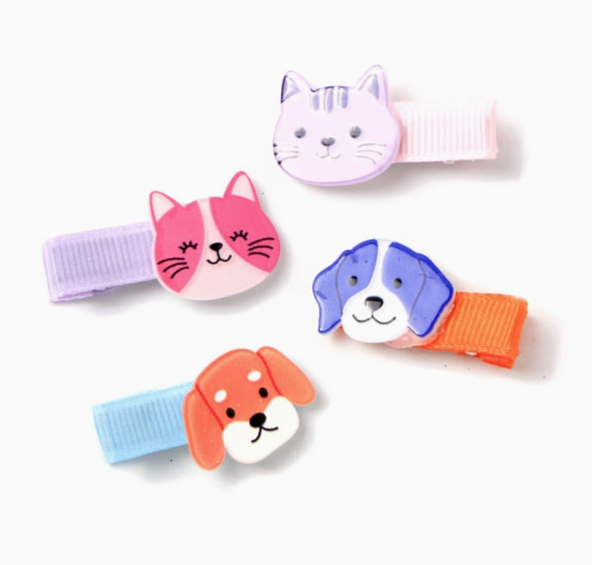 Cat and dog hair clips by Molly & Rose; display card includes two cat motifs and two dog motifs with ribbon-covered clips