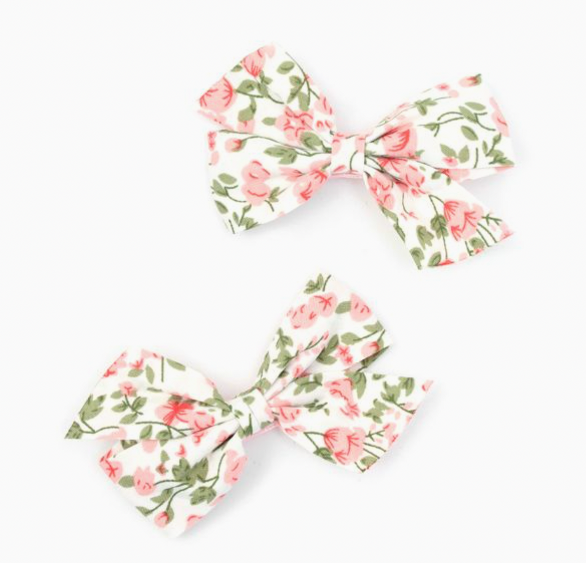 Floral bow hair clips by Molly & Rose; white 100% polyester fabric bows with printed detail on pink covered clips
