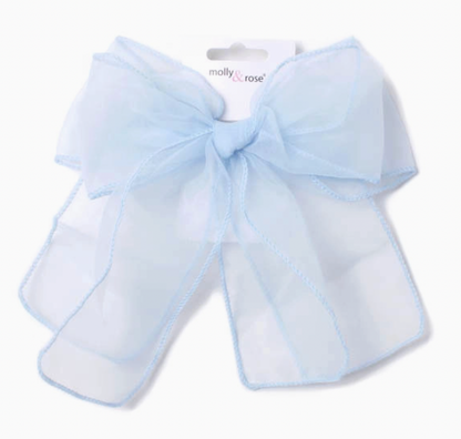 Large light blue chiffon bow hair clip by Molly & Rose; 100% polyester fabric bow with long flowing tails for occasion styling