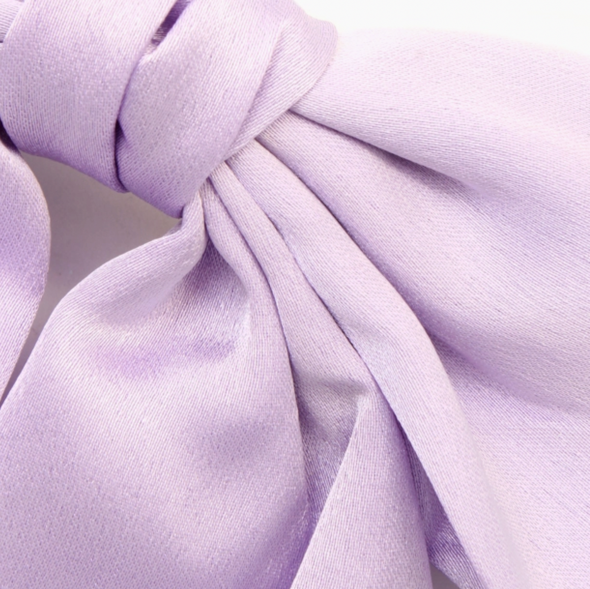 Large lilac hair bow by Molly & Rose; 100% polyester satin fabric bow with long flowing tails for occasion styling